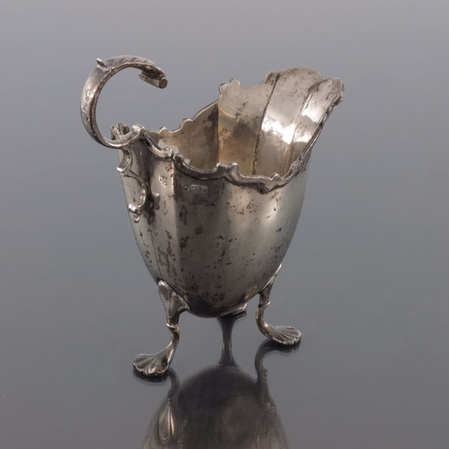 118 - An Edwardian silver jug, George Nathan and Ridley Hayes, Chester 1904, faceted domed helmet form wit... 