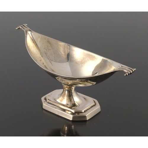 123 - A Victorian silver salt cellar, Thomas Bradbury and Sons, London 1895, pedestal twin handled boat fo... 