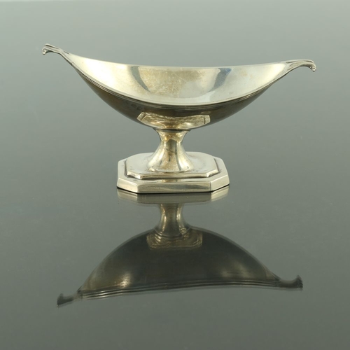 123 - A Victorian silver salt cellar, Thomas Bradbury and Sons, London 1895, pedestal twin handled boat fo... 