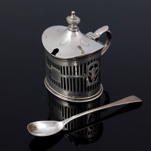 138 - An Edwardian reticulated silver mustard pot, George Fox, London 1905, oval section, bright cut and p... 