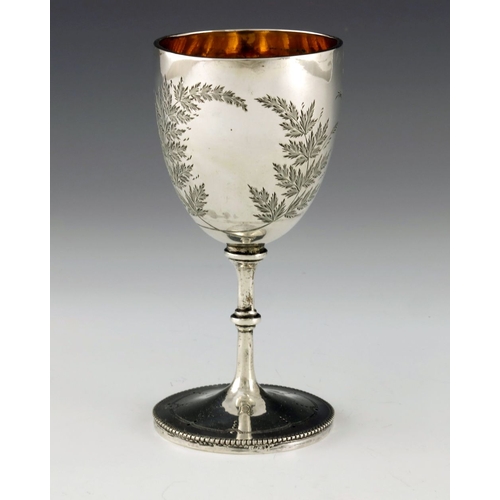 143 - A small Victorian silver goblet, H J Lias and Son, London 1875, the rounded bowl on cylinder knopped... 