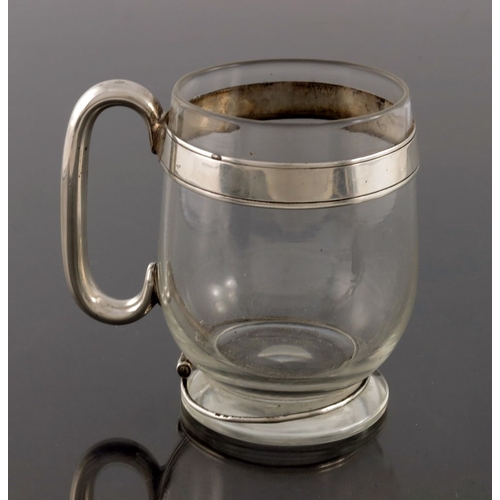 144 - A Victorian silver mounted glass mug, John Gough, Birmingham 1878, the footed and rounded beaker for... 