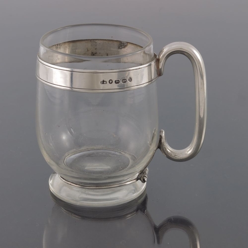 144 - A Victorian silver mounted glass mug, John Gough, Birmingham 1878, the footed and rounded beaker for... 