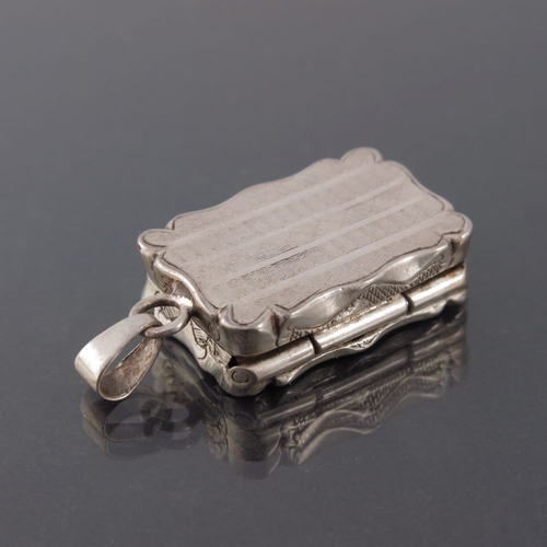 146 - A Victorian silver vinaigrette, David Pettifer, Birmingham 1851, castle top form ogee rim with engin... 