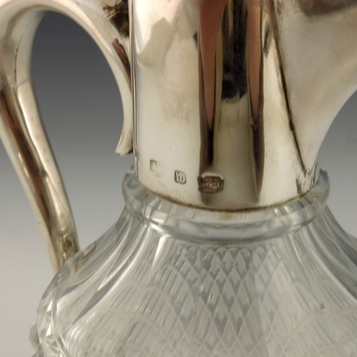 150 - A Victorian silver and cut glass claret jug, Plante and Co, Birmingham 1896, shouldered form, hobnai... 