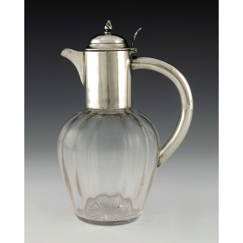 151 - An Edwardian silver mounted glass claret jug, Alexander Clark Manufacturing Co., Birmingham 1909, th... 