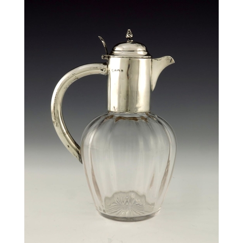 151 - An Edwardian silver mounted glass claret jug, Alexander Clark Manufacturing Co., Birmingham 1909, th... 