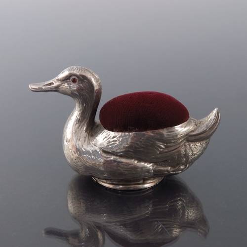 158 - A George V novelty silver pin cushion, Crisford and Norris, Birmingham 1922, in the form of a duck, ... 