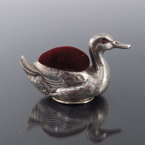 158 - A George V novelty silver pin cushion, Crisford and Norris, Birmingham 1922, in the form of a duck, ... 