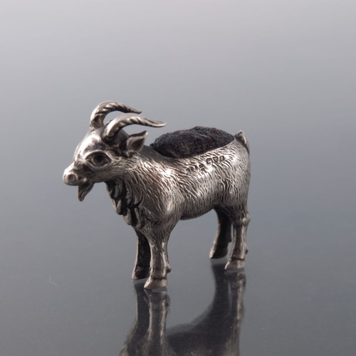 160 - An Edwardian novelty silver pin cushion, Adie and Lovekin, Chester 1909, modelled as a goat, 3cm hig... 