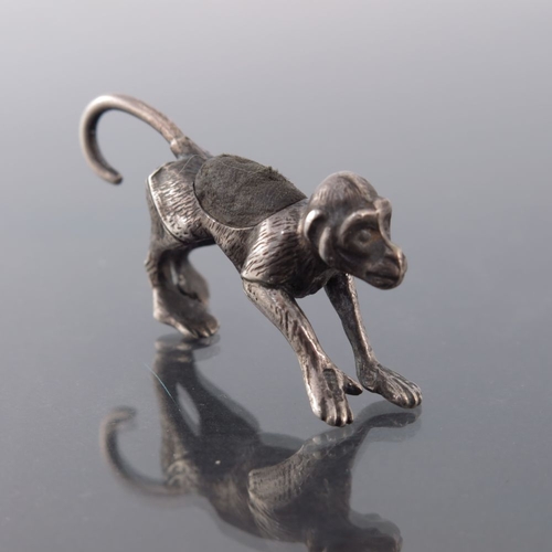 163 - An Edwardian novelty silver pin cushion, Levi and Salaman, Birmingham 1909, modelled as a monkey, wi... 