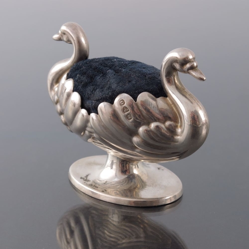 169 - A Victorian novelty silver pin cushion, Hilliard and Thomason, Chester 1897, modelled as two swans, ... 