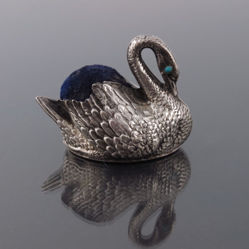 170 - An Edwardian novelty silver pin cushion, Levi and Salaman, Birmingham 1901, modelled as a swan, set ... 