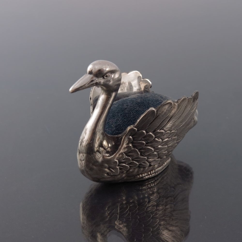 170 - An Edwardian novelty silver pin cushion, Levi and Salaman, Birmingham 1901, modelled as a swan, set ... 