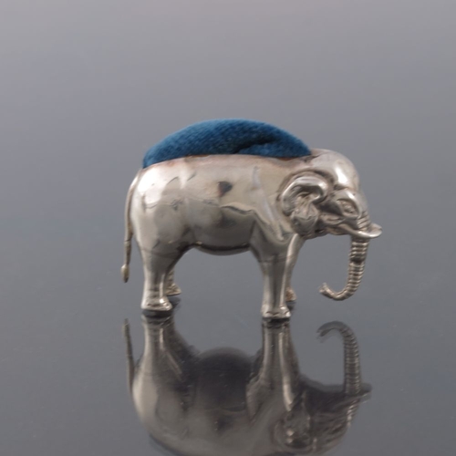 171 - An Edwardian novelty silver pin cushion, Saunders and Shepherd, Birmingham 1905, modelled as an elep... 