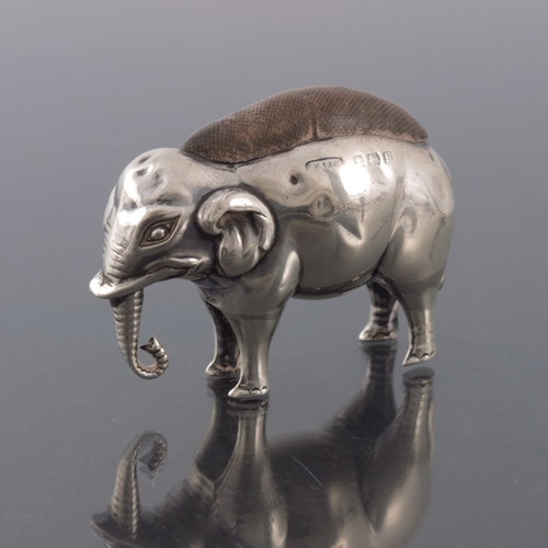 172 - An Edwardian novelty silver pin cushion, Adie and Lovekin, Birmingham 1907, modelled as an elephant ... 