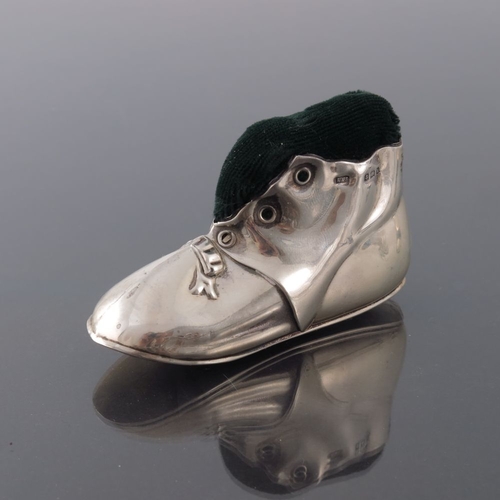 176 - An Edwardian novelty silver pin cushion, Levi and Salaman, Birmingham 1909, modelled as a boot or sh... 