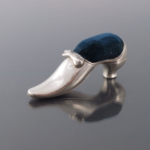 177 - An Edwardian novelty silver pin cushion, Adie and Lovekin, Birmingham 1901, modelled as a shoe, with... 