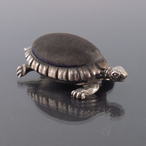 180 - An Edwardian novelty silver pin cushion, Saunders and Shepherd, Birmingham 1906, modelled as a turtl... 