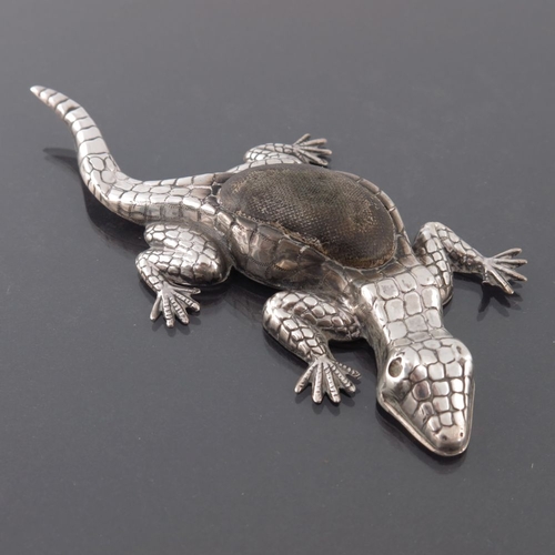 181 - An Edwardian novelty silver pin cushion, Crisford and Norris, Birmingham 1906, modelled as a lizard,... 