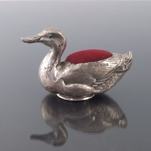 182 - An Edwardian novelty silver pin cushion, Crisford and Norris, Birmingham 1907, in the form of a duck... 