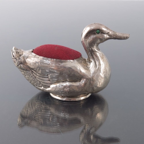 182 - An Edwardian novelty silver pin cushion, Crisford and Norris, Birmingham 1907, in the form of a duck... 