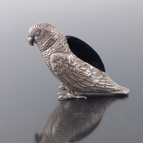 184 - An Edwardian novelty silver pin cushion, Adie and Lovekin, Birmingham 1908, modelled as a parakeet o... 