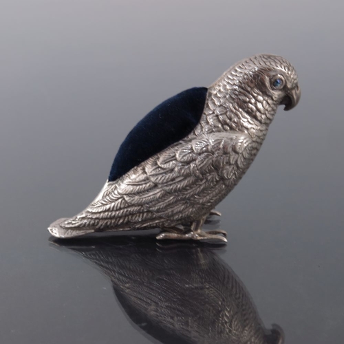 184 - An Edwardian novelty silver pin cushion, Adie and Lovekin, Birmingham 1908, modelled as a parakeet o... 