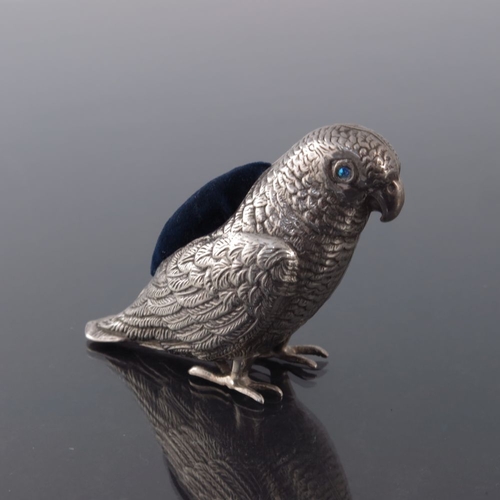 184 - An Edwardian novelty silver pin cushion, Adie and Lovekin, Birmingham 1908, modelled as a parakeet o... 