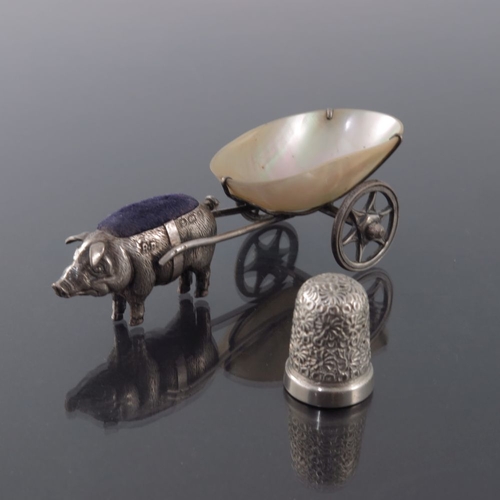 191 - A George V novelty silver pin cushion and thimble dish, Robert Pringle, Birmingham 1910, modelled as... 