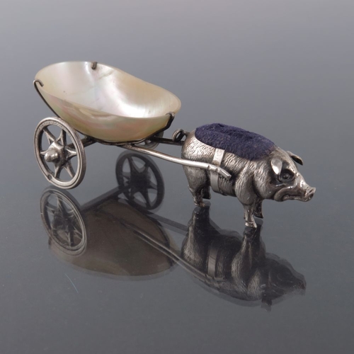 191 - A George V novelty silver pin cushion and thimble dish, Robert Pringle, Birmingham 1910, modelled as... 