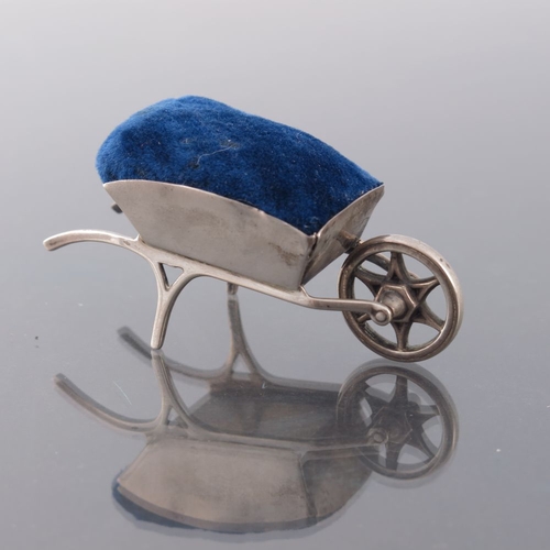 196 - An Edwardian novelty silver pin cushion, Adie and Lovekin, Birmingham 1908, modelled as a wheelbarro... 