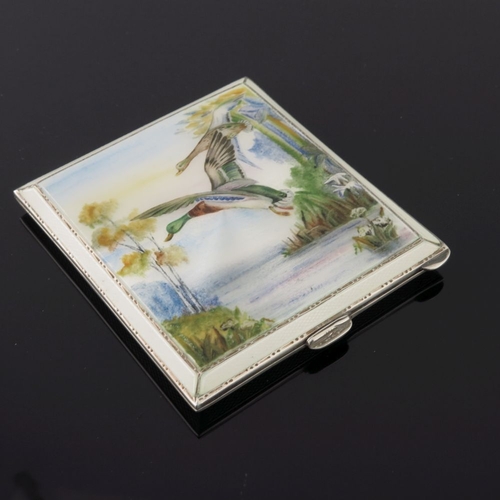 203 - A George VI silver square powder compact, the cover enamelled with Mallard in flight, maker Henry Cl... 