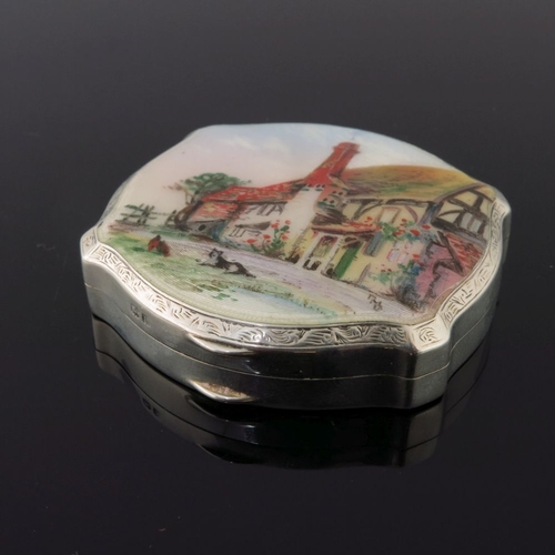 204 - An Elizabeth II silver rectangular pill box, the cover enamelled with a view of St Paul's Cathedral,... 