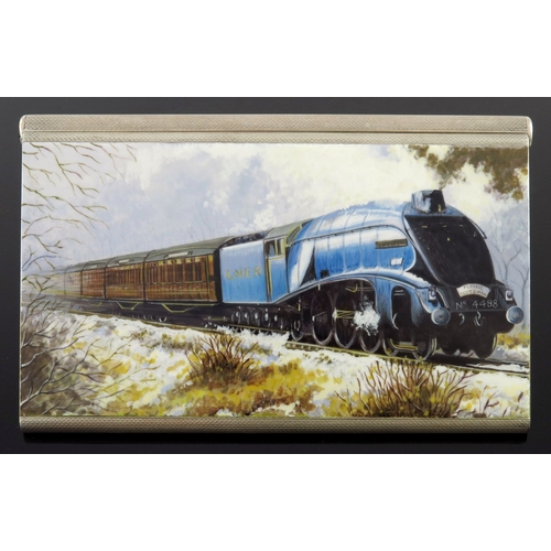 206 - A George VI silver pocket cigarette case, engine turned, the cover enamelled with an image of a stre... 