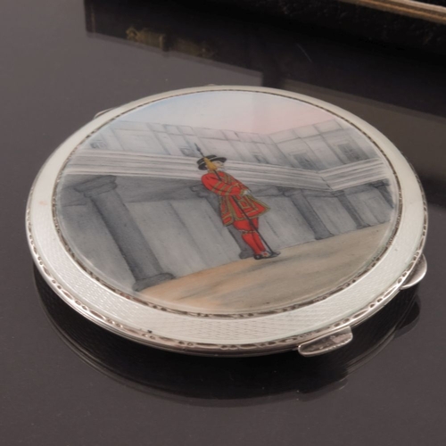 208 - An Elizabeth II silver powder compact with enamelled Beefeater to the cover, Henry Clifford Davis, B... 