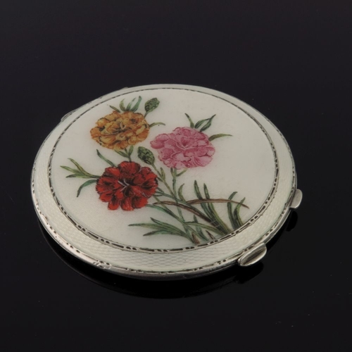 209 - A silver octagonal powder compact in cream guilloche enamel with painted cornflowers, a circular cre... 