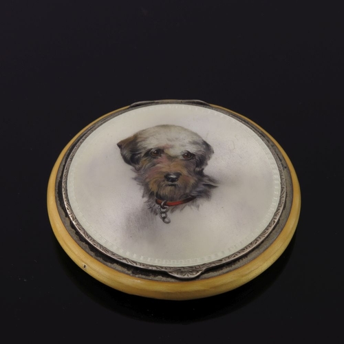 210 - A George V silver and enamel circular powder compact, the cover with a portrait of a dog, the base y... 