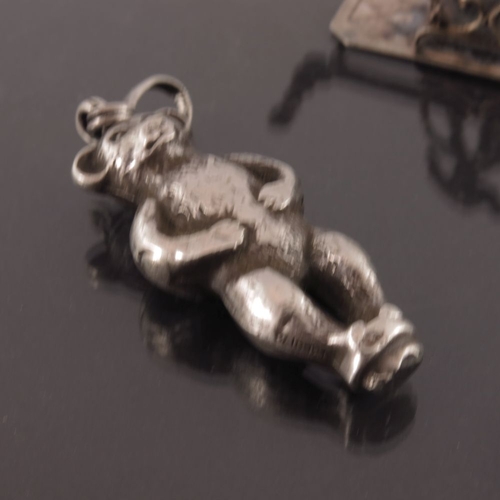 217 - A George V silver teddy bear fob, Crisford and Norris, Birmingham 1934, together with a Dutch silver... 