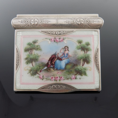 222 - A George V silver snuff box, the cover with enamelled Rococo scene of a courtly couple in a landscap... 