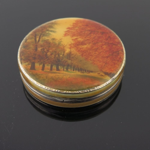 236 - A silver orange guilloche enamel powder compact, the lid with a river landscape, together with three... 