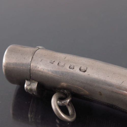 239 - A Victorian silver combination vesta whistle, Birmingham 1897, curved tubular form with engraved scr... 