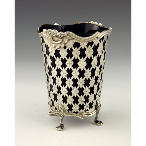 245 - An Edwardian reticulated silver and glass vase, Thomas Bradbury and Sons, Sheffield 1902, the conica... 