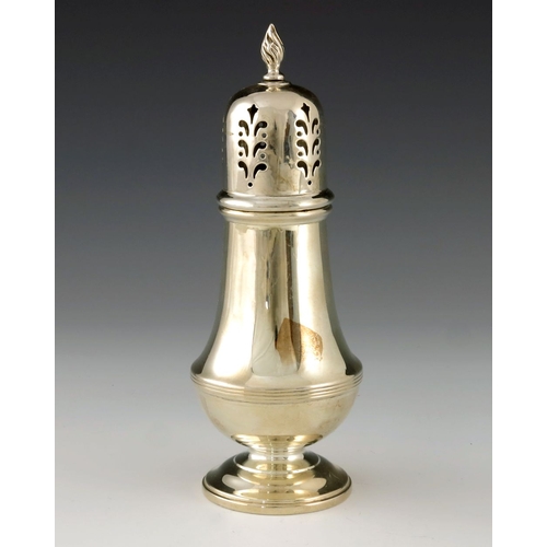 250 - An Elizabeth II silver shaker, Henry Clifford Davis, Birmingham 1961, footed baluster form reeded ba... 