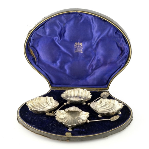 251 - A set of four Victorian silver salt cellars, George Unite, Birmingham 1897, modelled as scallop shel... 