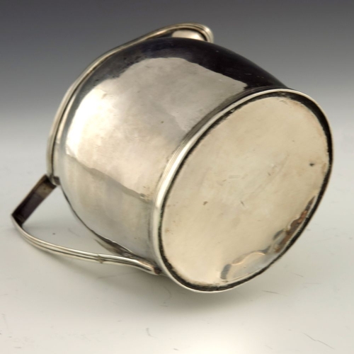 252 - A George III silver cream jug, Crispin Fuller overstruck Samuel Godbehere, London 1795, helmet form ... 