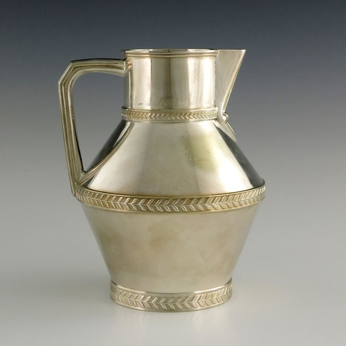 254 - After Christopher Dresser for Watcombe, a silver plated jug in the Aesthetic style, angled baluster ... 