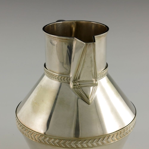 254 - After Christopher Dresser for Watcombe, a silver plated jug in the Aesthetic style, angled baluster ... 