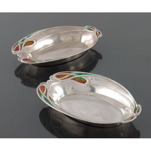 260 - Kate Harris for William Hutton and Sons, a pair of Arts and Crafts silver and enamelled dishes, Lond... 