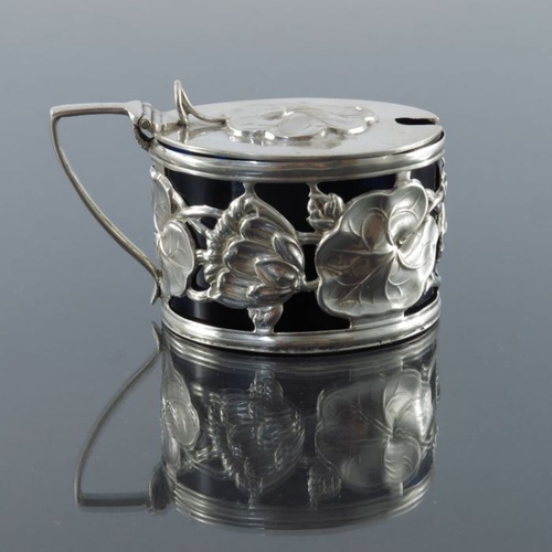 261 - An Arts and Crafts silver mustard pot, Alexander Clark Manufacturing Co, Birmingham 1902, oval secti... 